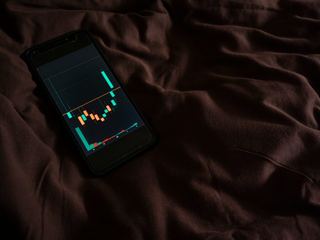 Phone with sleep data on bed